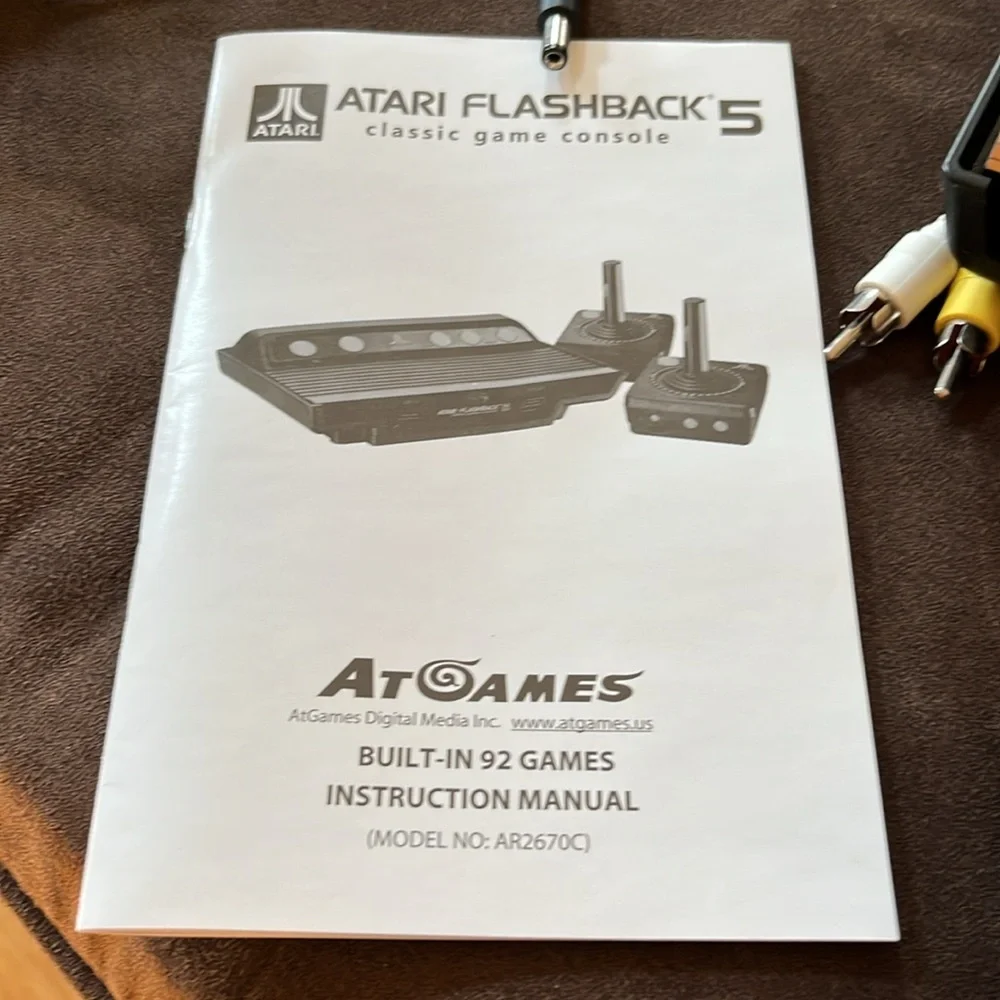 Atari flashback 5 wireless game console and two controllers